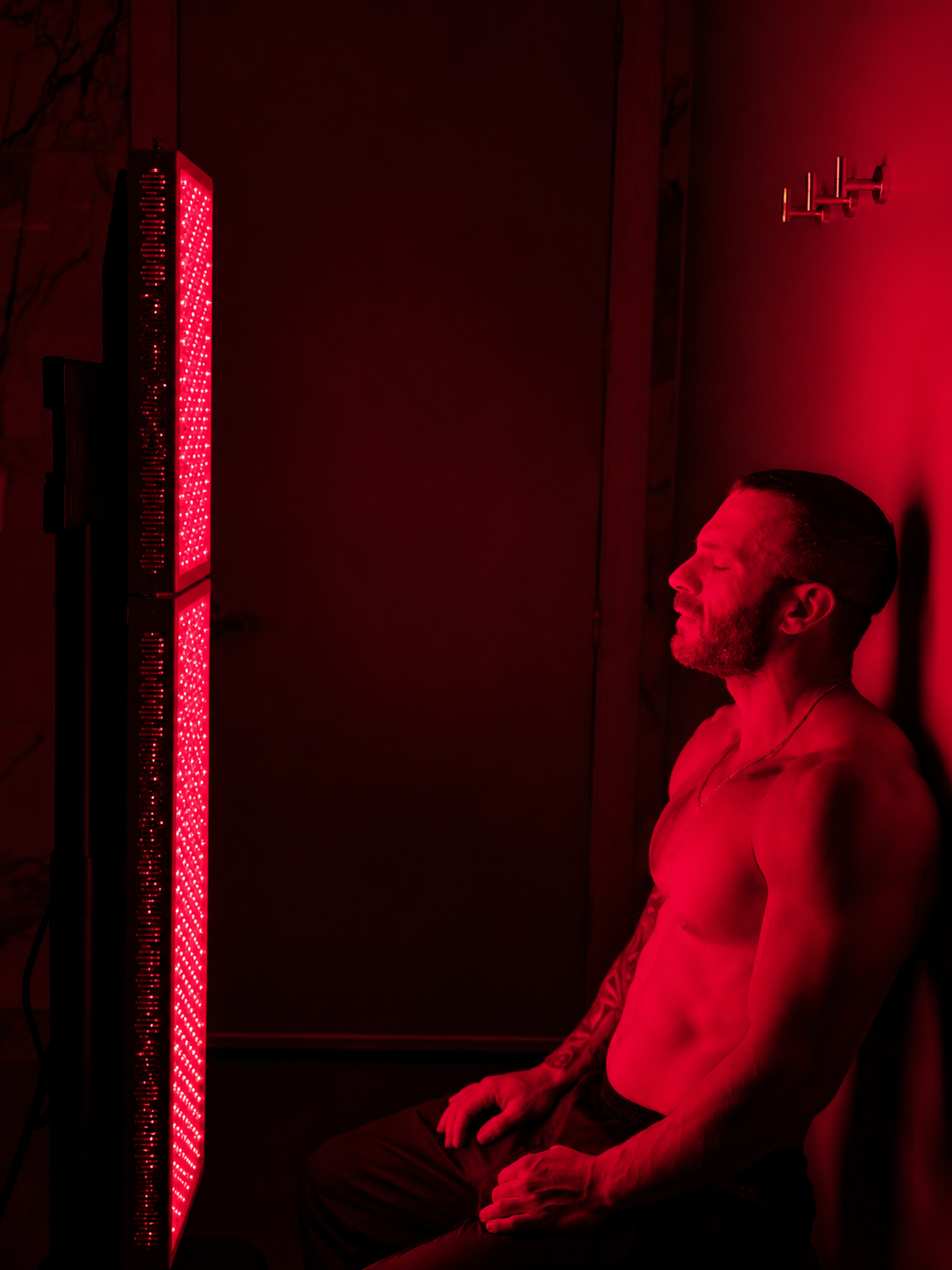 Full-body red light therapy session at Float G.O.A.T.S.